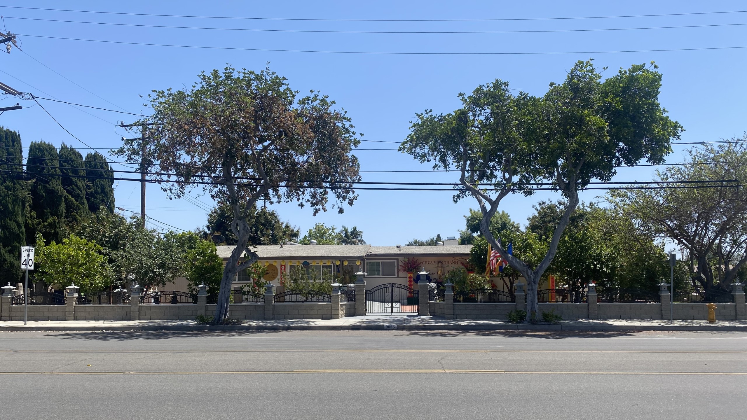 street view of a ranch house turned Buddhist temple